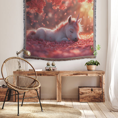 Baby Unicorn Resting Under Glowing Cherry Blossom Tree with Soft Pink Petals and Golden Sunlight Woven Throw Blanket - Awakening Righteousness