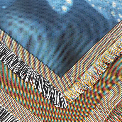 CloseUp of Dew Kissed Blue Flower with Vibrant Orange Center Woven Throw Blanket for Home Decor - Awakening Righteousness