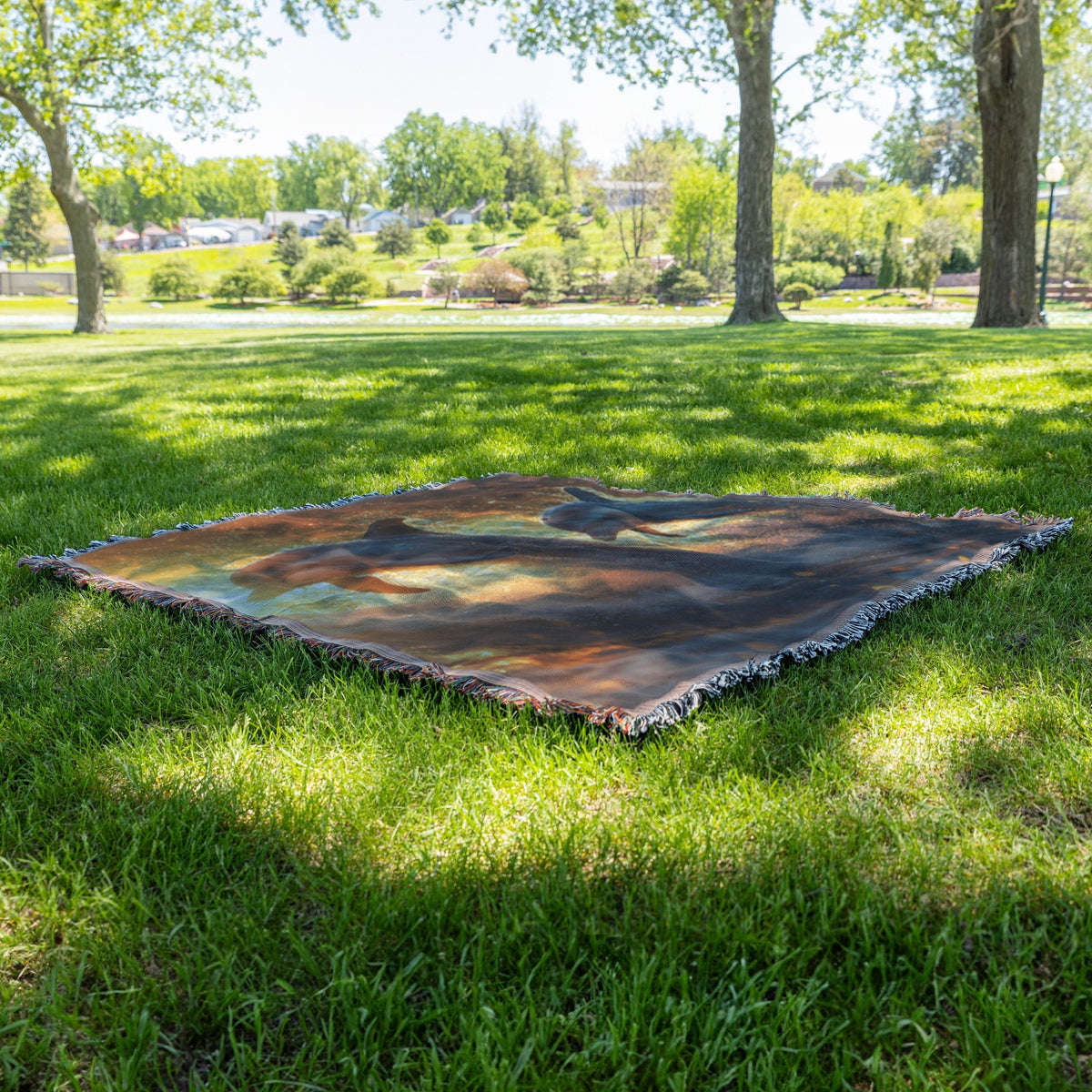 Dolphins Jumping Through Glowing Waves Under Golden Sunset Woven Throw Blanket - Awakening Righteousness