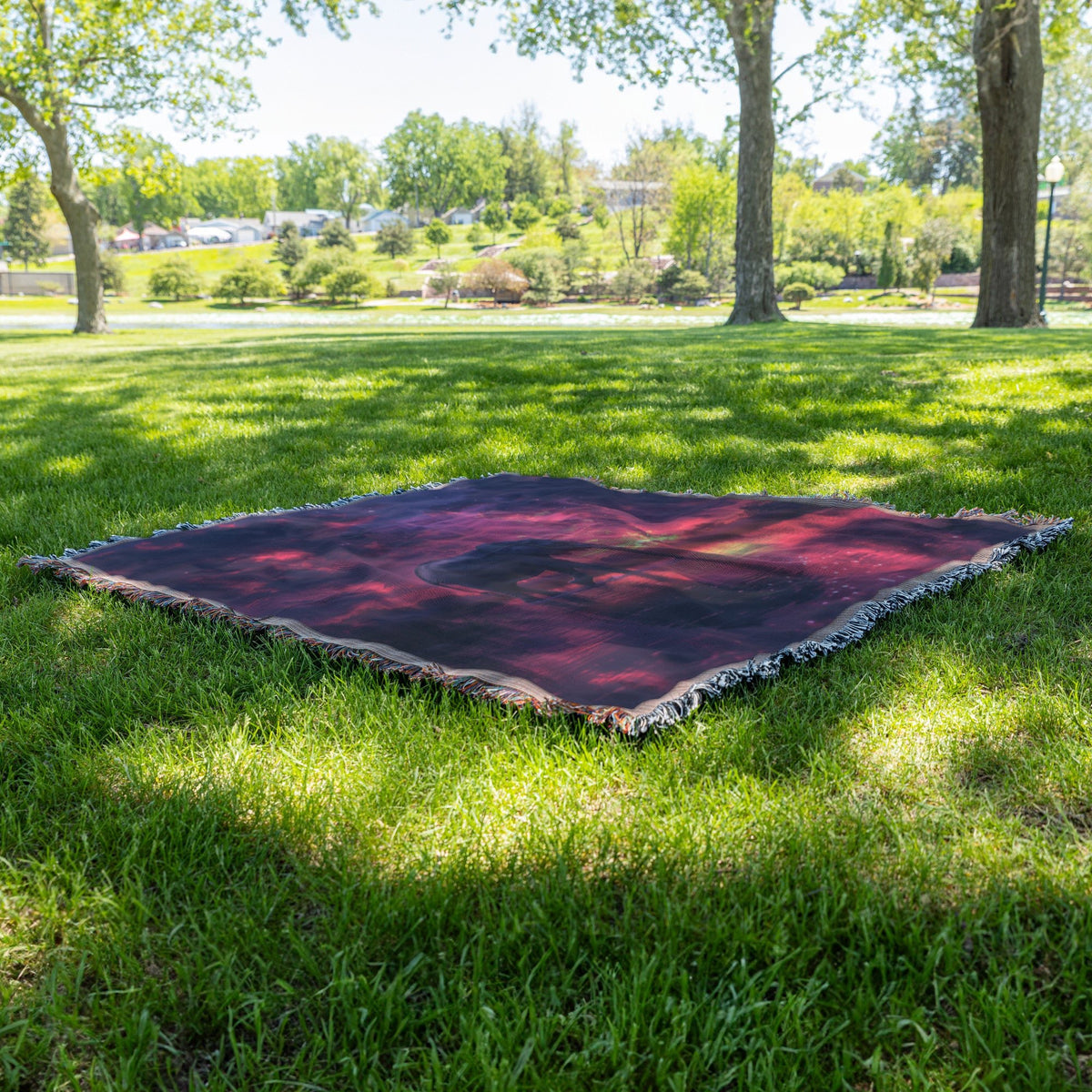 Elephant Walking Peacefully Across Glowing River Under Twilight Sky with Vibrant Water Reflection Woven Throw Blanket - Awakening Righteousness