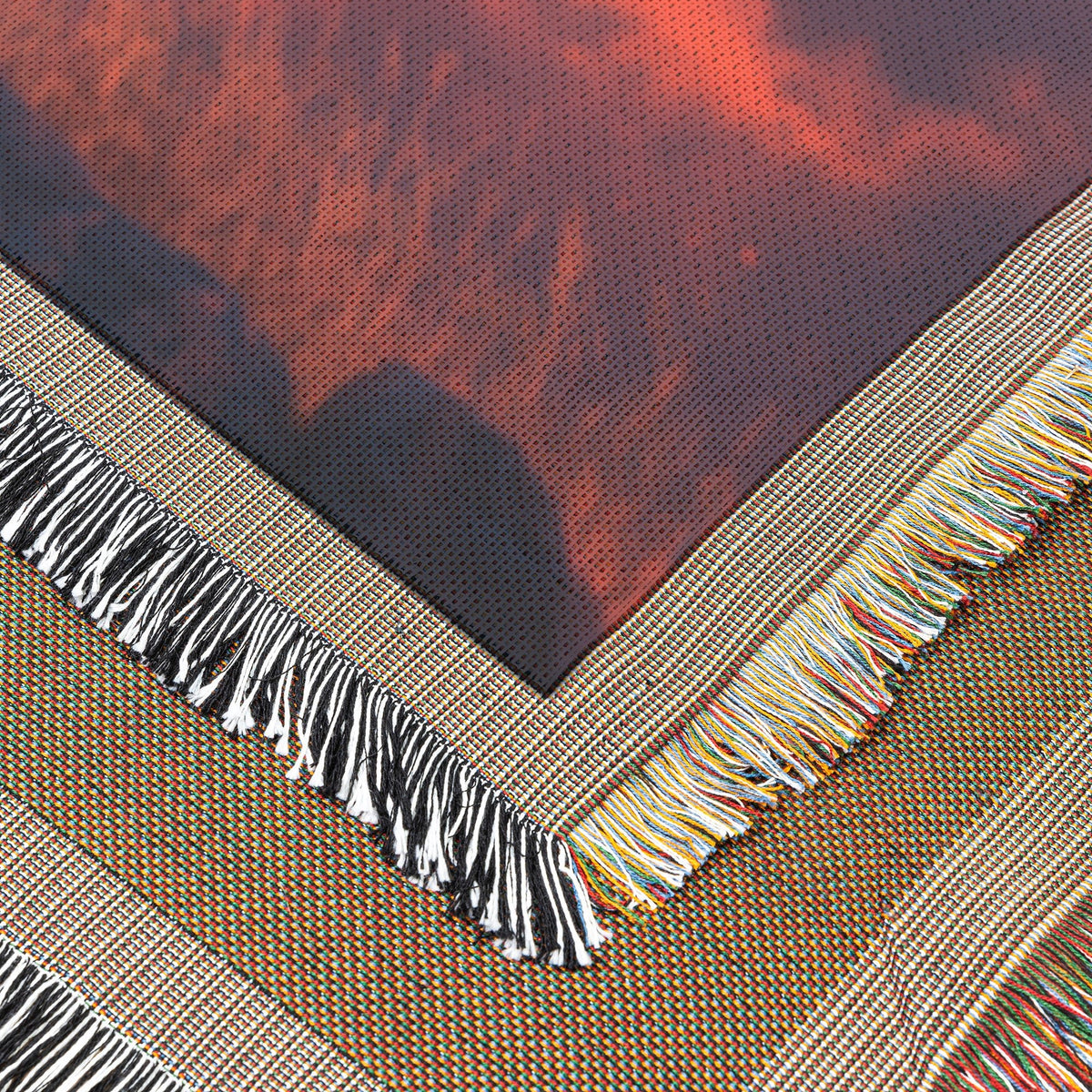 Majestic Lion on Rocky Savanna Ridge Under Glowing Red and Orange Sunset with Illuminated Golden Mane Woven Throw Blanket - Awakening Righteousness