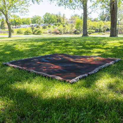 Playful Raccoon Reaching for Fireflies in Vibrant Glowing Meadow with Soft Twilight Hues Woven Throw Blanket - Awakening Righteousness