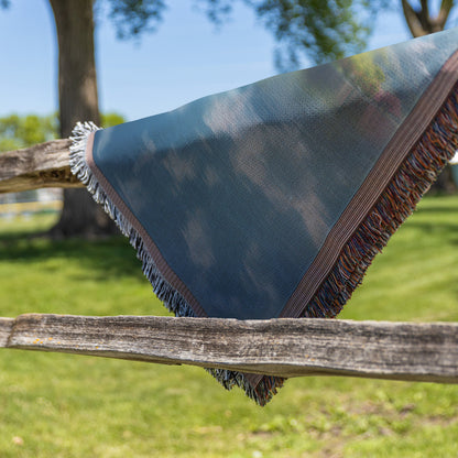 Serene Mountain Lake with Blooming Trees Woven Throw Blanket - Awakening Righteousness